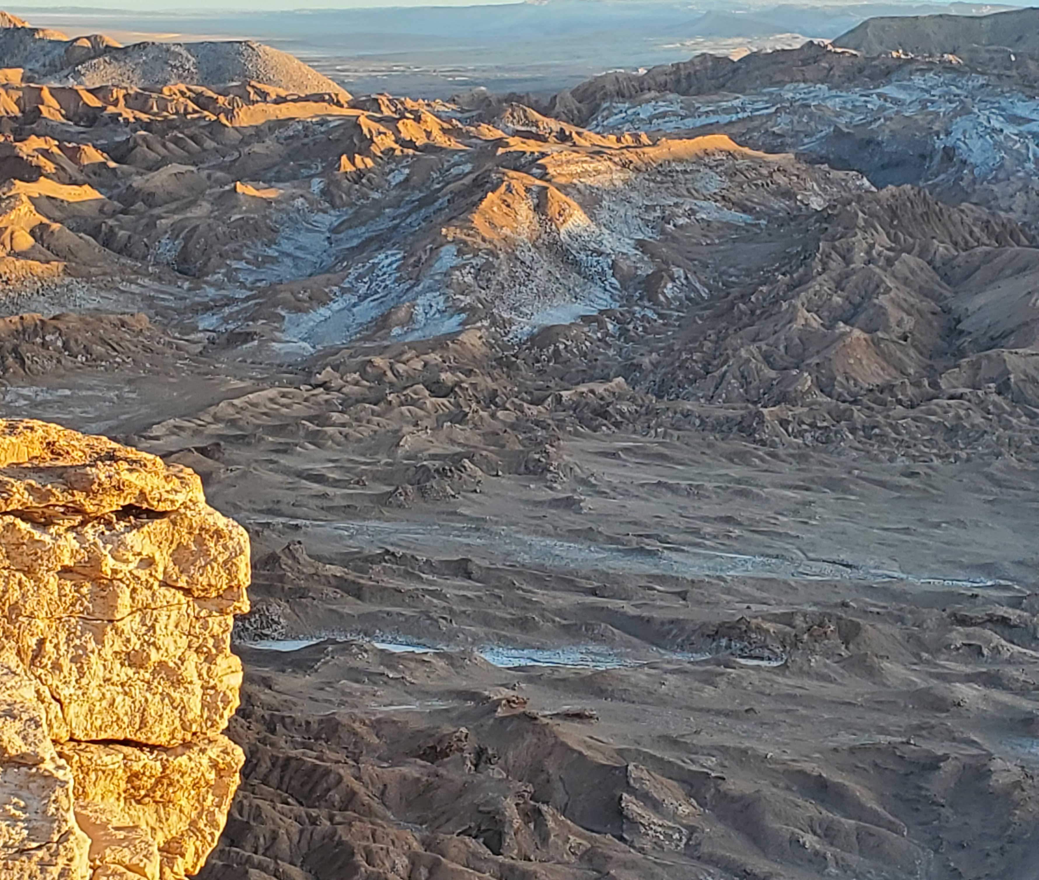 Smiling face watching the sunset over the Valle de la Luna