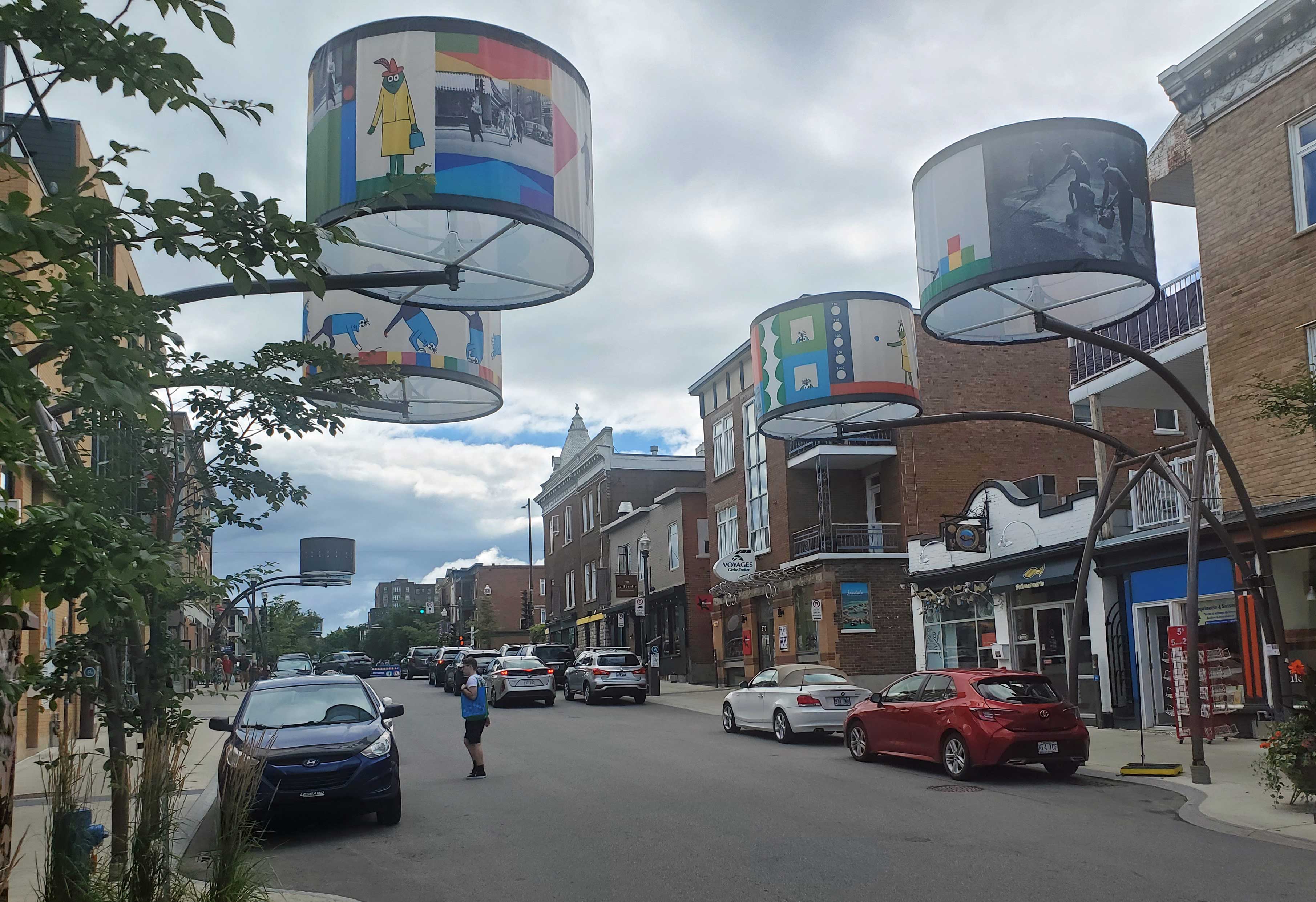 Lumière sur l’art lamps photographed while walking to breakfast in Quartier Montcalm