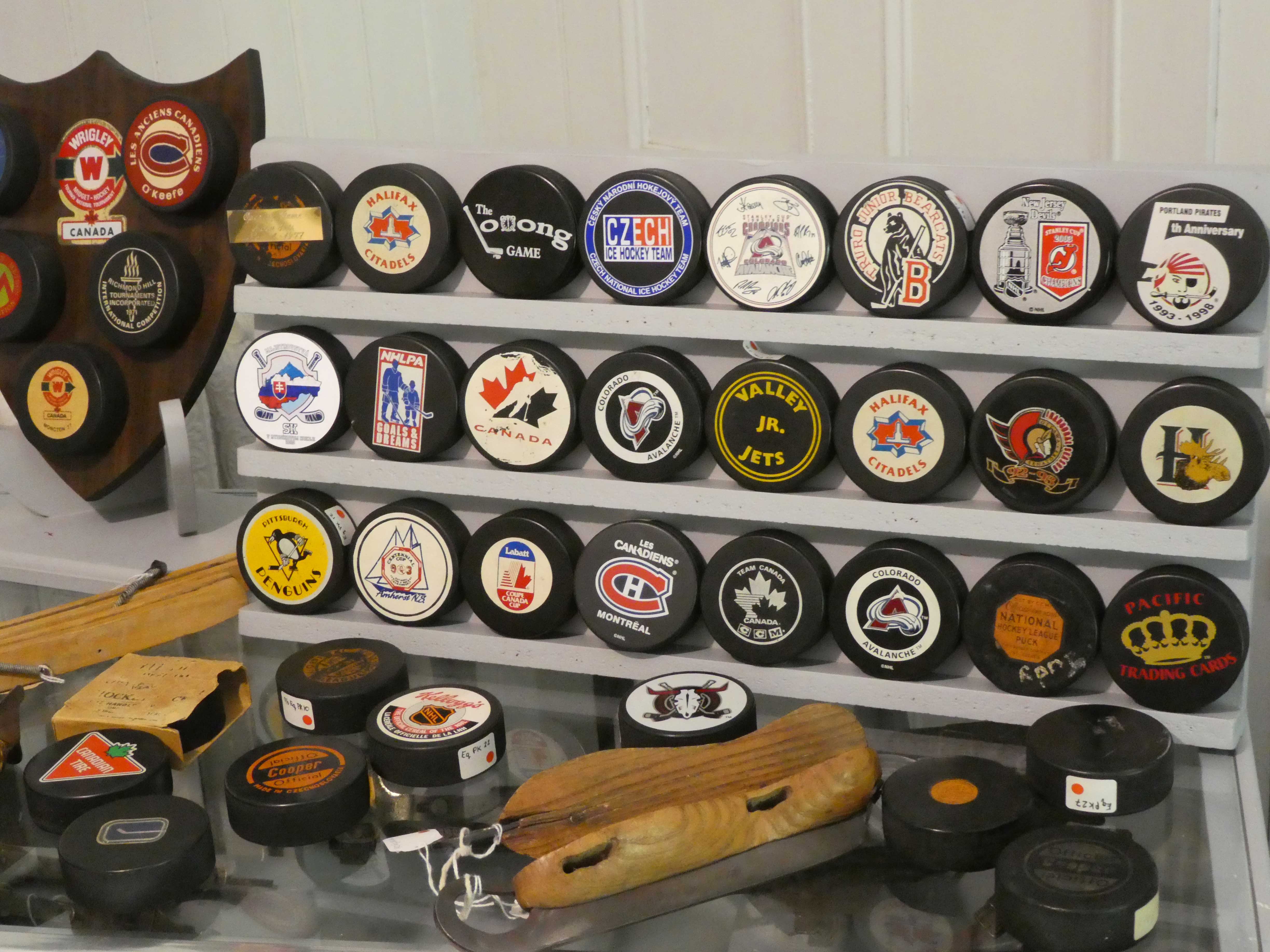Colorado Avalanche pucks on display in the Canadian Hockey Heritage Museum