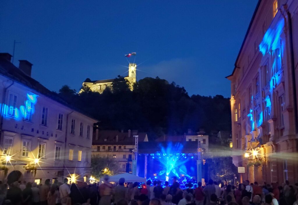 Night concert in Novi Trg with Ljubljana Grad in the background