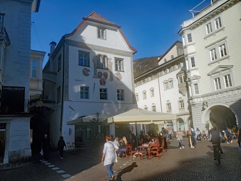 Public square in Bolzano featuring Austrian-influenced architecture
