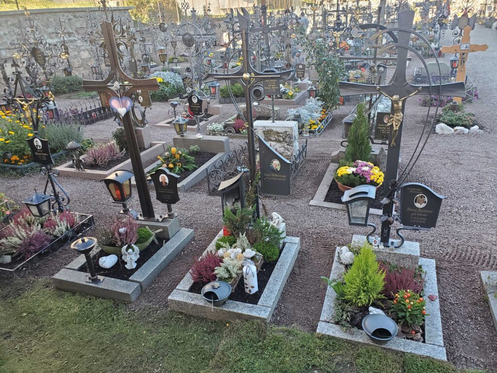 Cemetery behind the church in Kastelruth, Italy