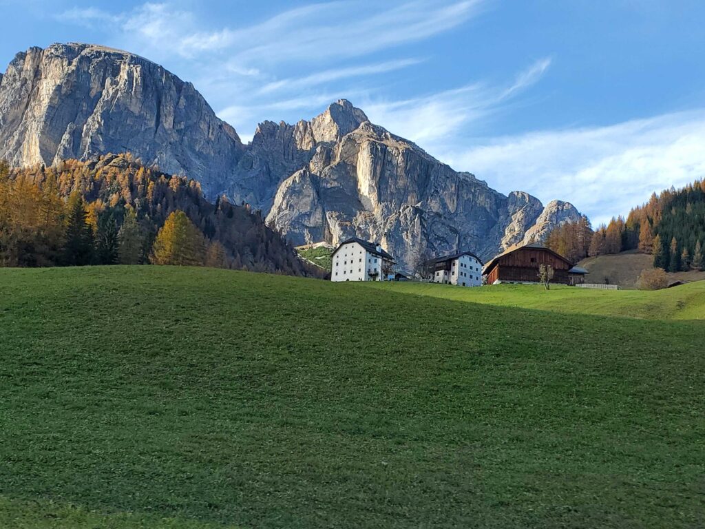 Farms and pastures outside Kastelruth with a Dolomite backdrop