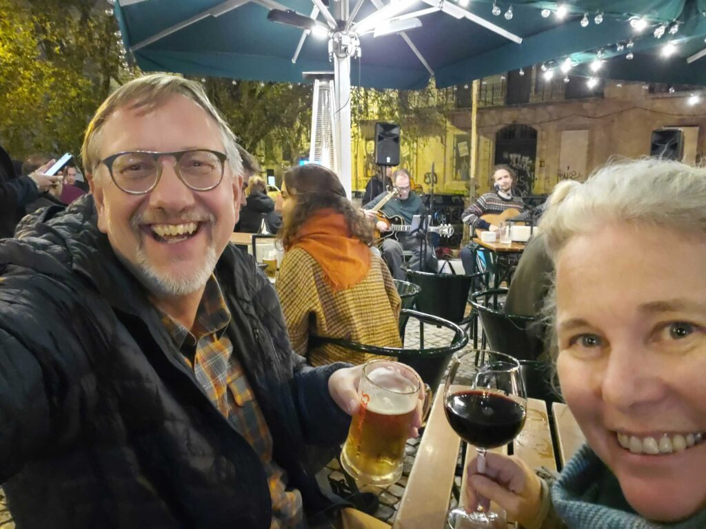 Andrea and Jake celebrating the return of their lost luggage in Lisbon, Portugal